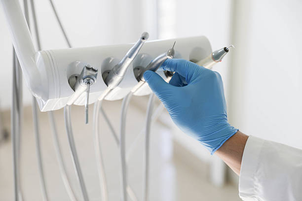 Professional Tooth Extraction technician working in Fairplains, NC